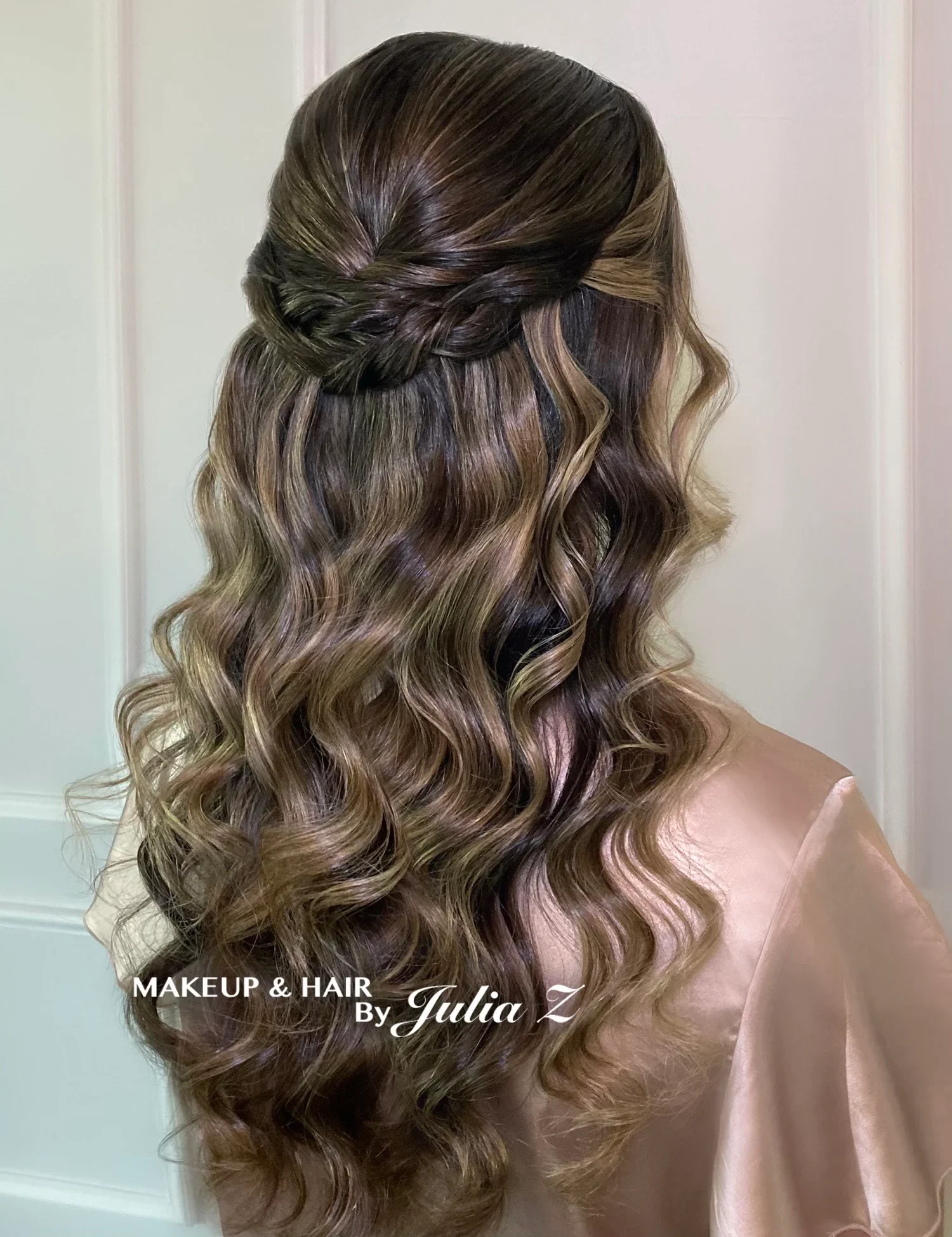 Wedding day updo and bridal makeup by Glow Salon stylists