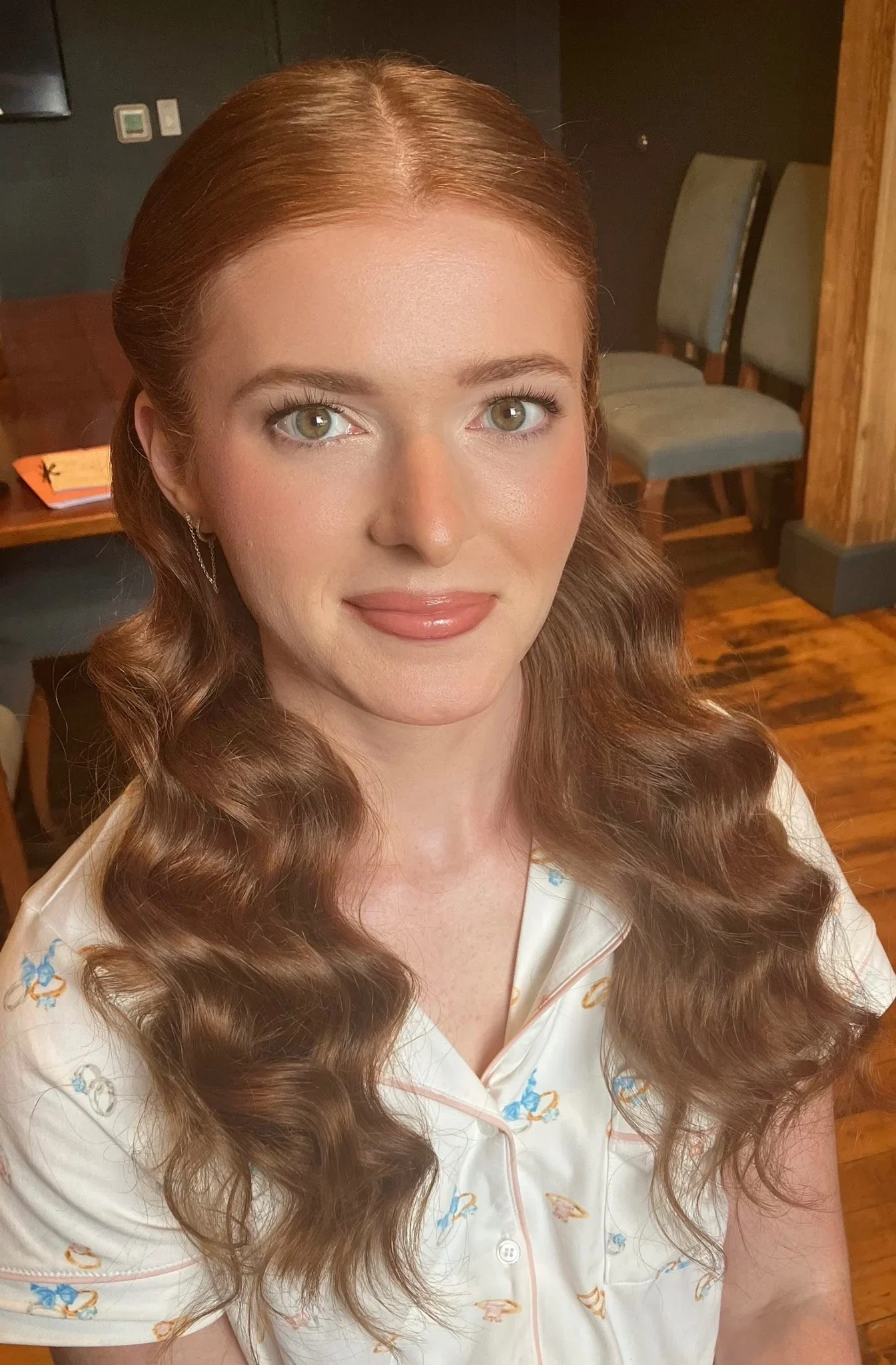 Auburn bridal hairstyle with glossy Hollywood waves and soft-glam makeup by Glow Salon & Spa in Carmel, Indiana