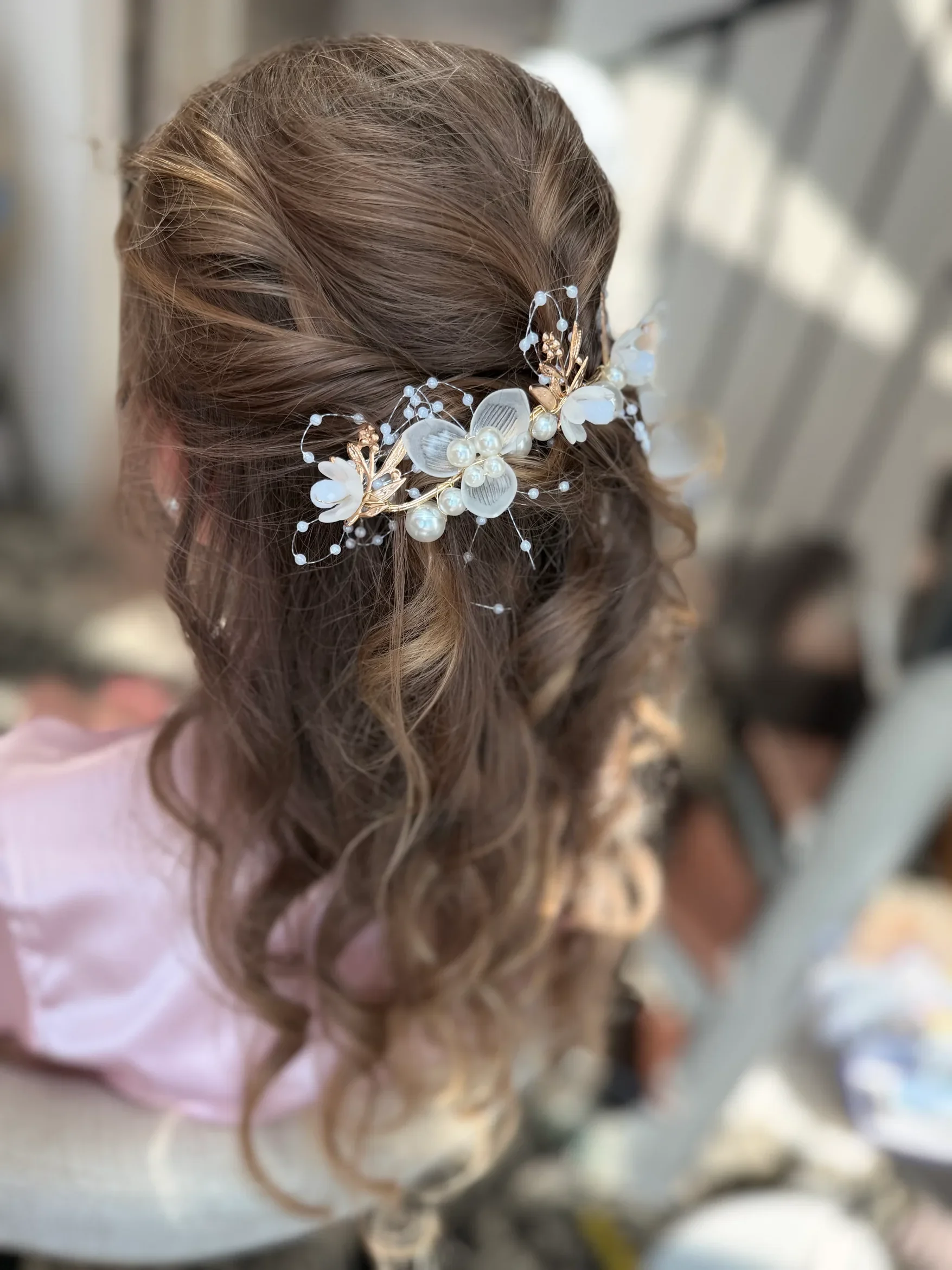 Bridal curls with pearl and floral hairpiece by Glow Salon & Spa