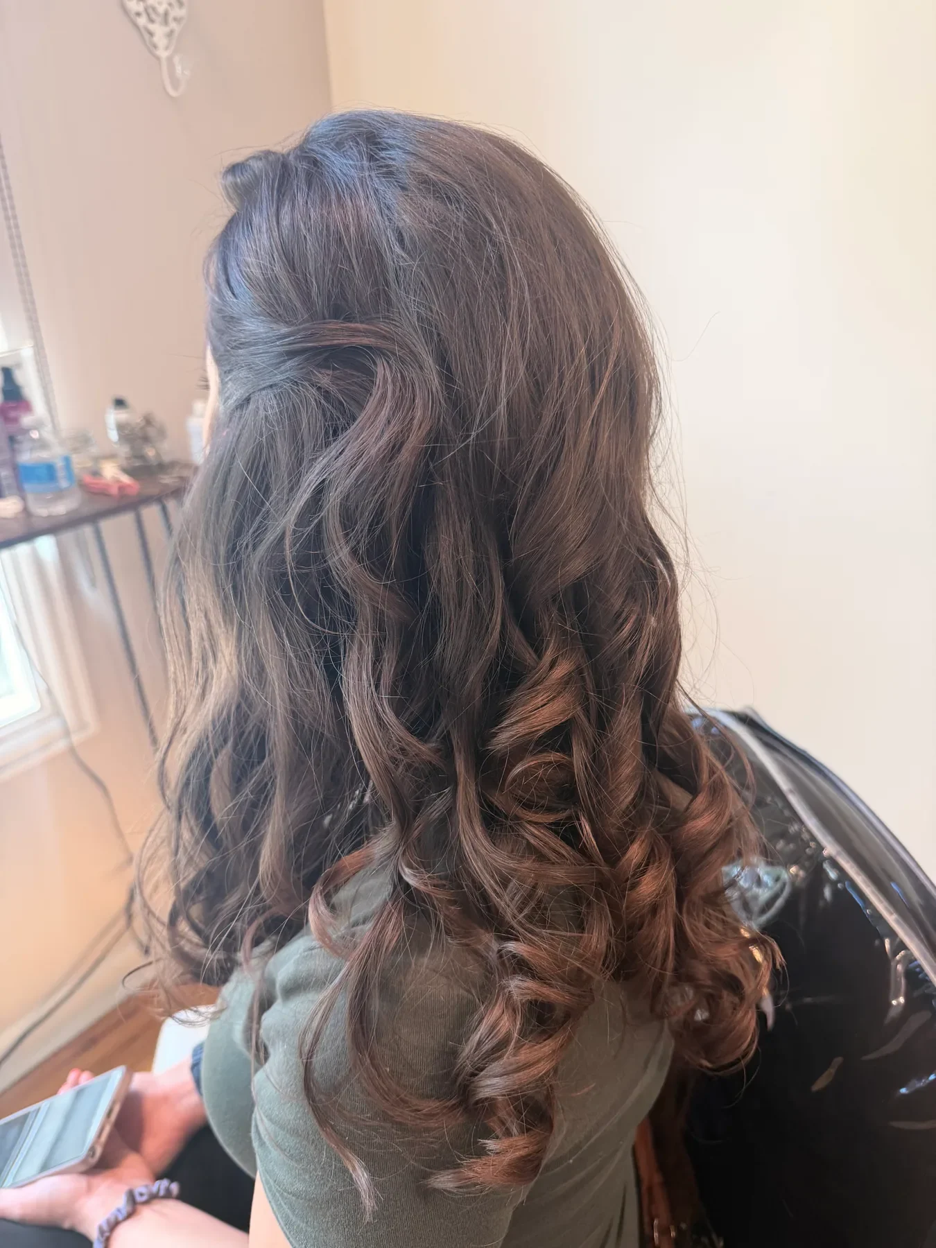 Formal half-up brunette hairstyle with long curls by Glow Salon & Spa